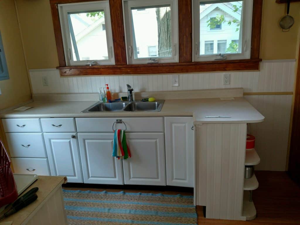 Adding PVC beadboard to a kitchen backsplash adds a cottage look and is perfect for a wet area