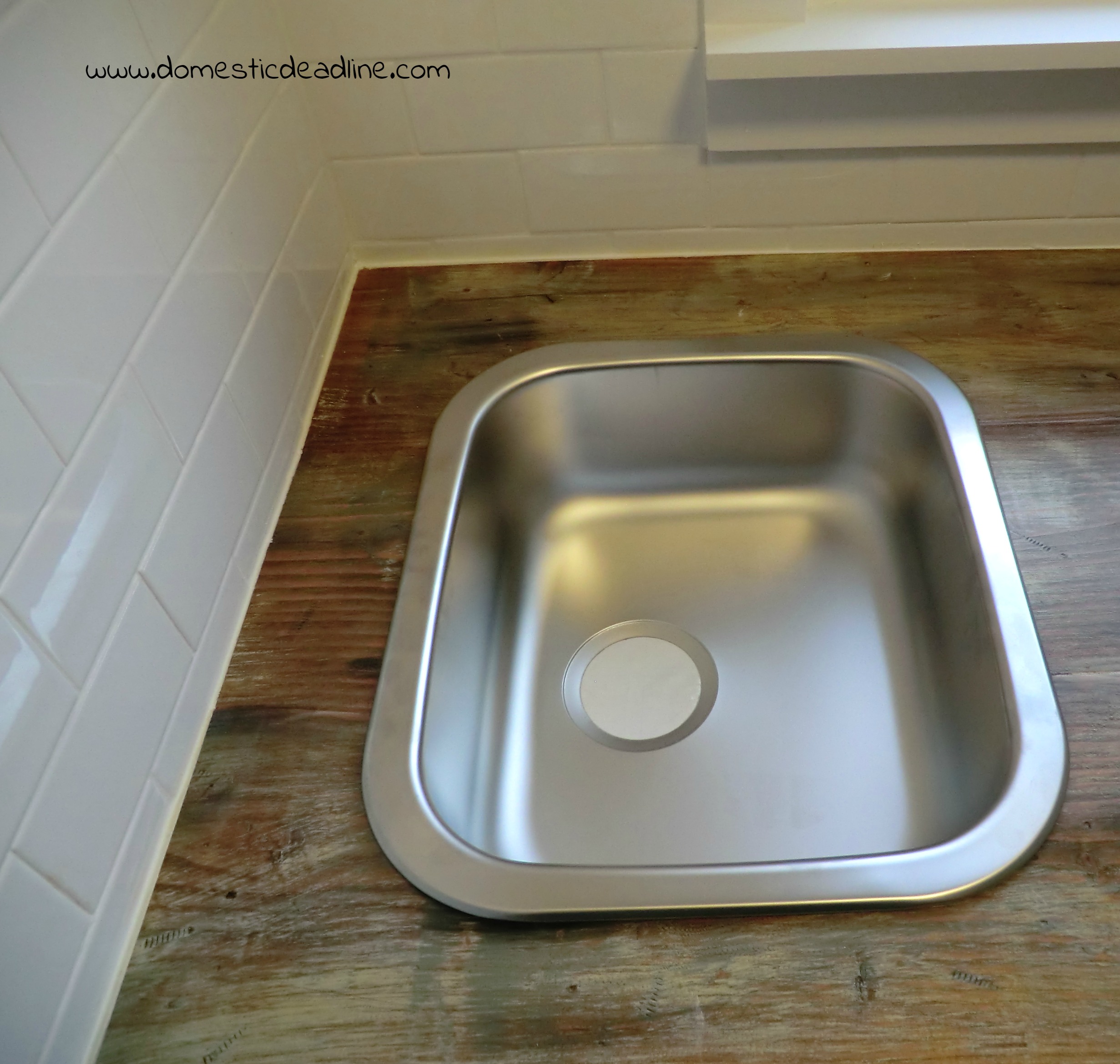 farmhouse-mudroom-makeover-subway-tile