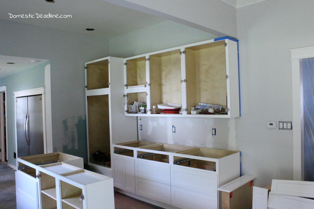 Installing Kitchen Cabinets in our DIY Kitchen - Domestic Deadline