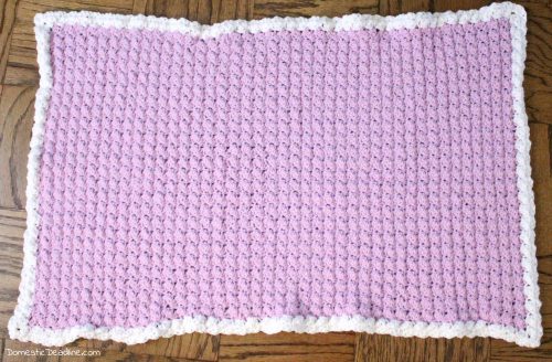 Easy crochet baby blanket great for using up yarn you have on hand. Free Pattern! Plus, lots of great ideas for using the craft supplies you already have. Domestic Deadline