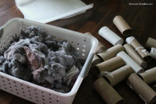 These easy DIY fire starters with dryer lint and toilet paper tubes are a great way to use things that would otherwise go in the trash. Wrapped in wax paper to ignite the fire