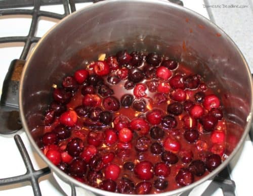 Using fresh cherries to make a sweet and tangy cherry barbecue sauce great for pork or chicken. Can the sauce and use all year long www.domesticdeadline.com