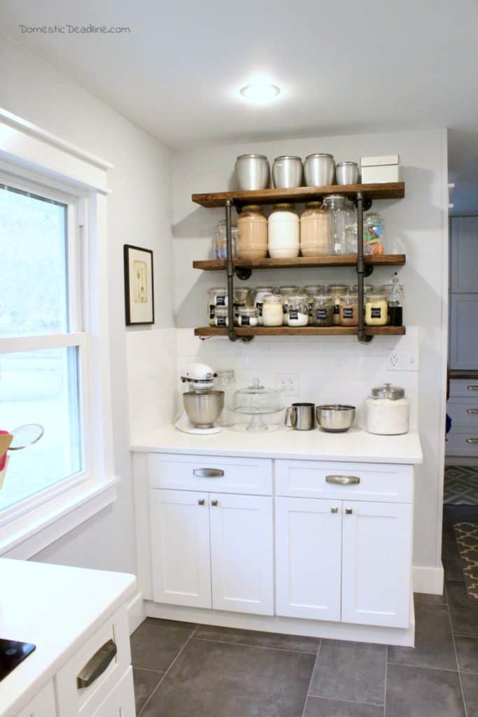 Learn why and how you should add open shelving to your kitchen. Functional decorating means more kitchen storage without a renovation. Free printable guide! DomesticDeadline.com