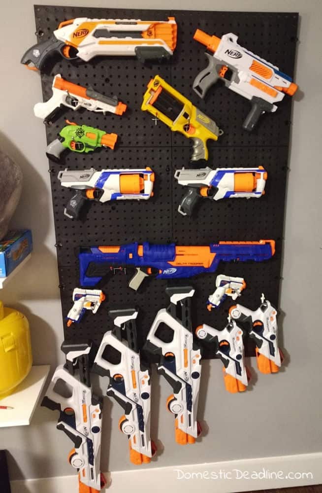 Learn how we easily made a customizable Nerf wall to display and organize all of my son's Nerf guns. This quick project can grow as his collection expands! DomesticDeadline.com