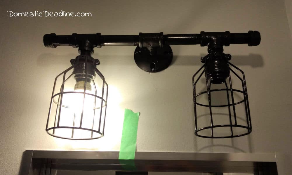 Learn how to use gas pipes to build an industrial farmhouse light fixture. Gas pipe fittings and some electrical supplies for a one of a kind light fixture DomesticDeadline.com