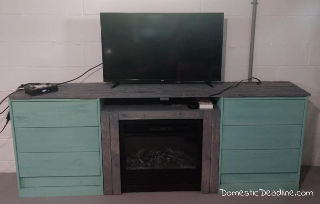Learn how to use Ikea Rast dressers and an electric fireplace to make a custom entertainment center. Plus more thrift store upcycles. DomesticDeadline.com